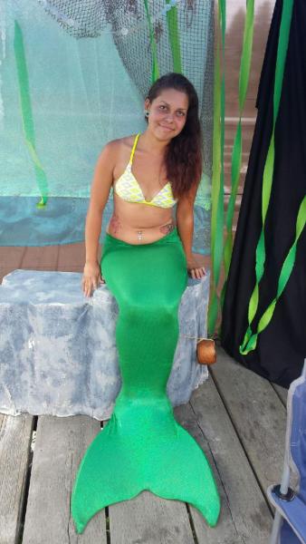 Mermaid at Ocean Suites Motel, swims to annual Pirates Festival, held annually at Port of Brookings-Harbor